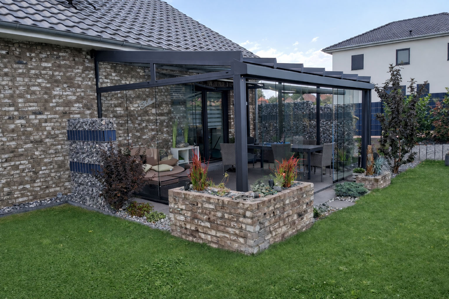 Terrassenueberdachung glas seitenwand naturstei…